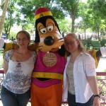 Me and my friend posing with the lifesize Goofy character.