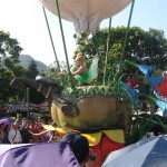 Tinkerbell in her balloon dancing in the parade