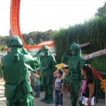 Green soldier characters drill children at the Hong Kong themepark.