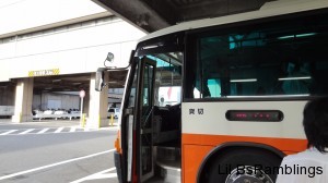 The front of a bus, or airport limo, that took us to the plane.