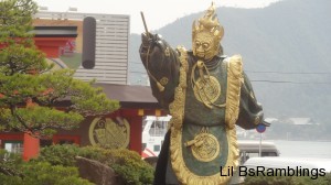 Ametal diety in green with lots of gold fringe overlooking the road to the ferry terminal