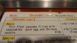 An image of a menu describing the local version of the dish.