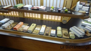 A number of colorful cookies and bars on display