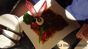 Lettuce ears, egg and olive eyes, and a cherry tomato give the impression of a bunny on this beef and vege dish